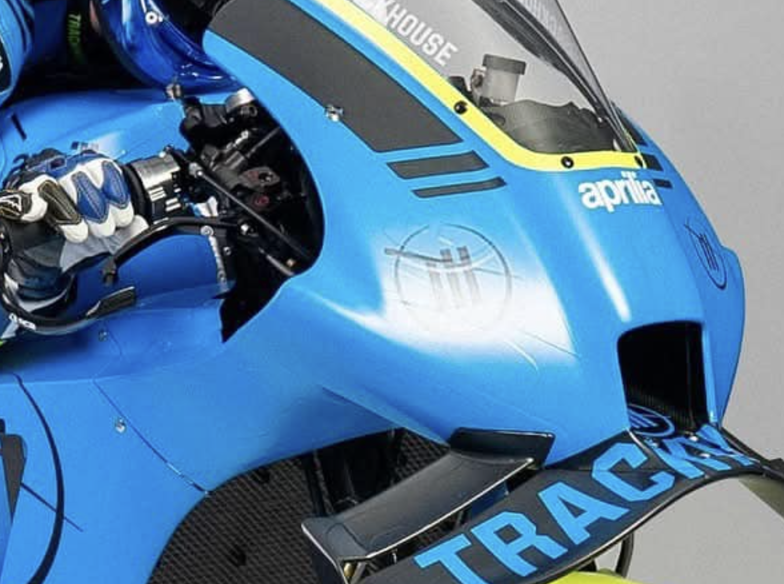 Tell-tale lines in the vinyl show the old livery still on the fairings